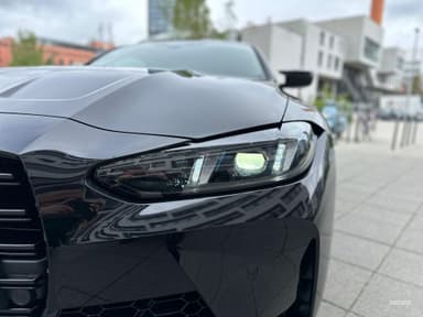 bmw m4 competition 2024 front close up